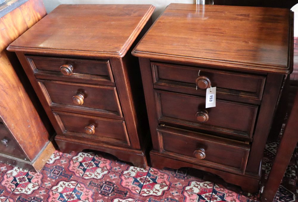 A pair of Willis & Gambier walnut three drawer bedside chests, width 50cm depth 40cm height 66cm